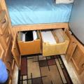 Two deep storage drawers under the bed.