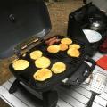 Pancakes and bacon on the BBQ. Not perfect yet, but will get better with practice.